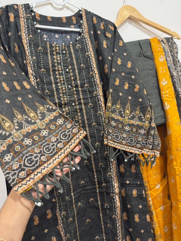 Embroidered cotton suits